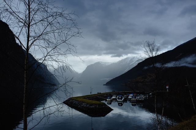 Fjord with mountains in background